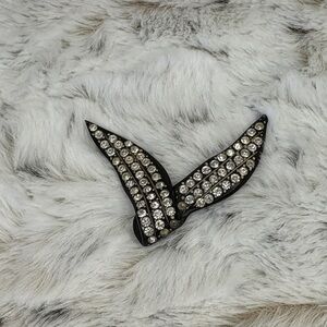 Elegant Black and Silver Winged Brooch
